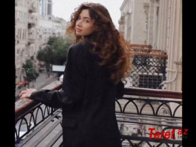 Bakının mərkəzində eyvanda alt paltarsız çəkiliş edən qızın