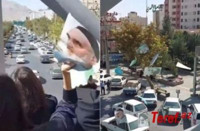 İranda gənc qızlar Xomeyninin şəklini cırdılar — VİDEO