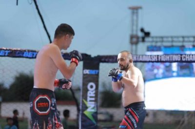 Ruslan Tağıyev Özbəkistanın məşhur idmançısını məğlub edərək çempion oldu - FOTOLAR